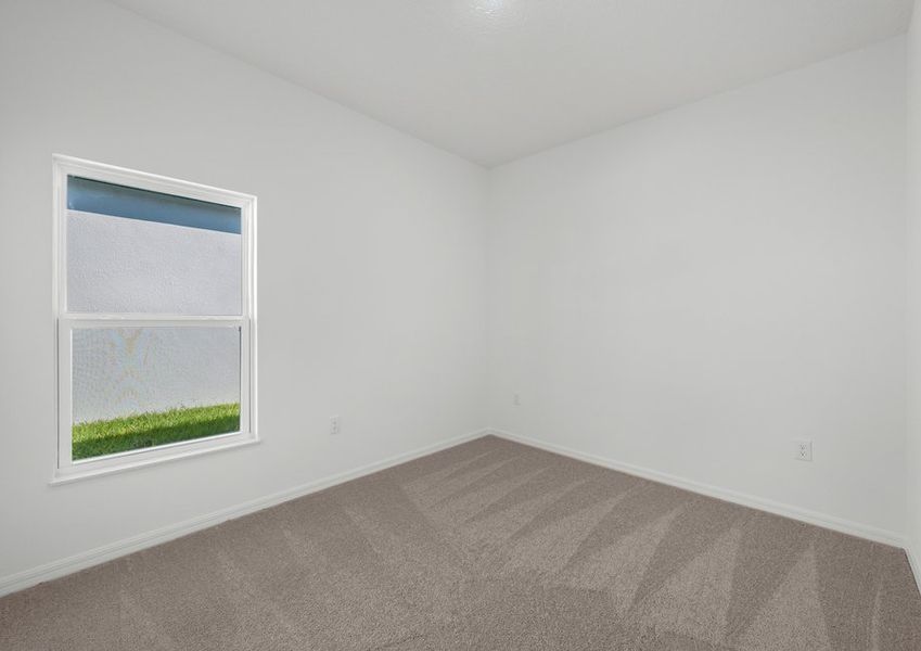 The secondary bedrooms include lush carpeting and recessed lighting The secondary bedrooms include lush carpeting and recessed lighting