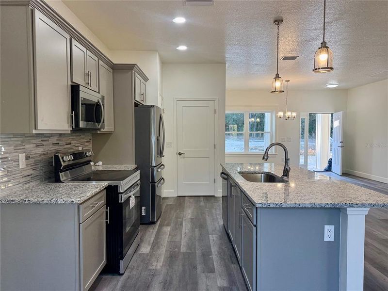 Furnished interior view inside a new home in , Williston (Image 3).