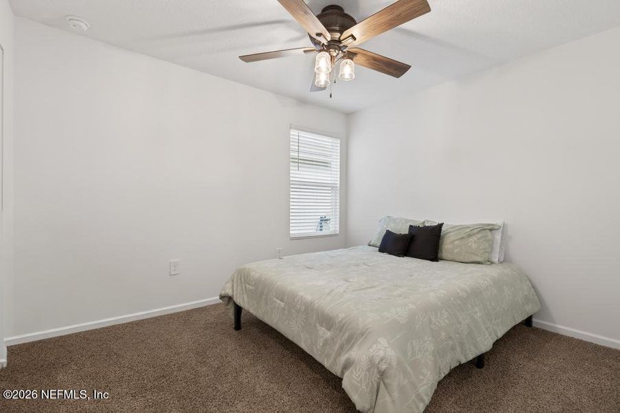 Furnished interior view inside a new home in Cross Creek Express, Green Cove Springs (Image 7).