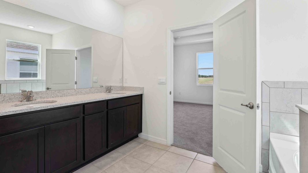 Representative furnished interior of a home built from the Laurel by D.R. Horton in Ocala Preserve, Ocala (Image 12).