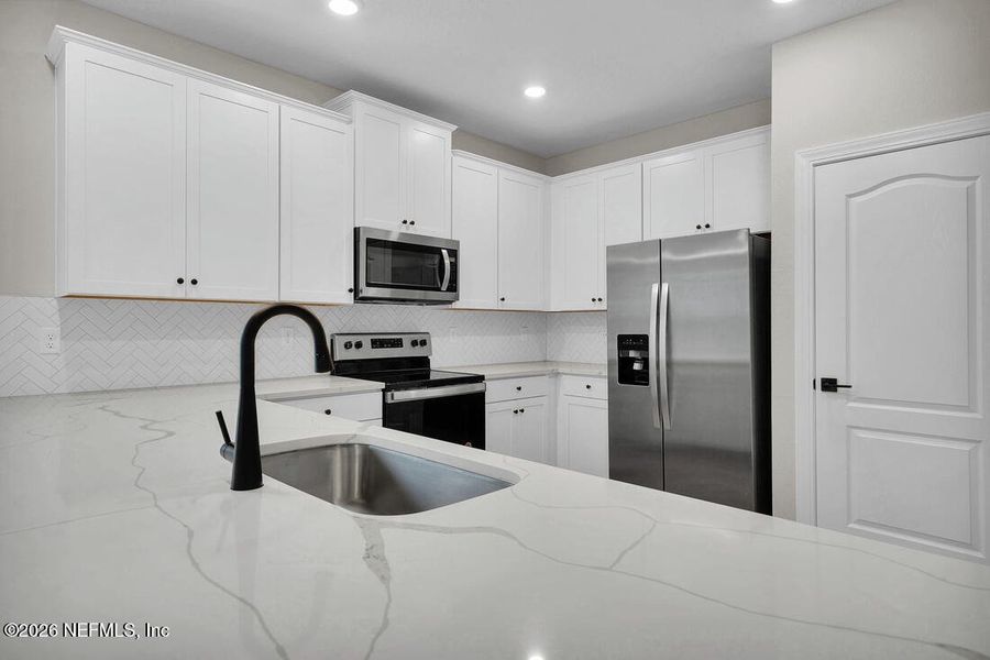 Furnished interior view inside a new home in , Jacksonville (Image 6). Furnished interior view inside a new home in , Jacksonville (Image 6).