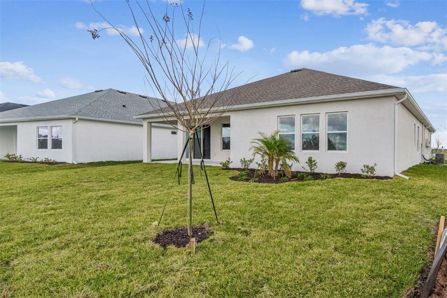 Exterior details and patio area of a home in Coasterra, Palmetto (Image 28).