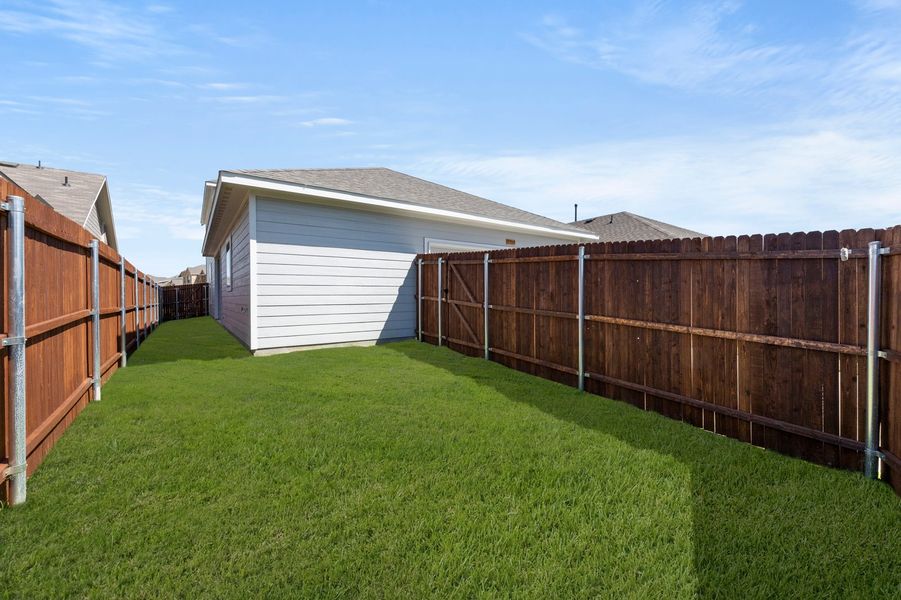 Front exterior of a new home in Heartland, Crandall, TX, highlighting curb appeal (Image 28).