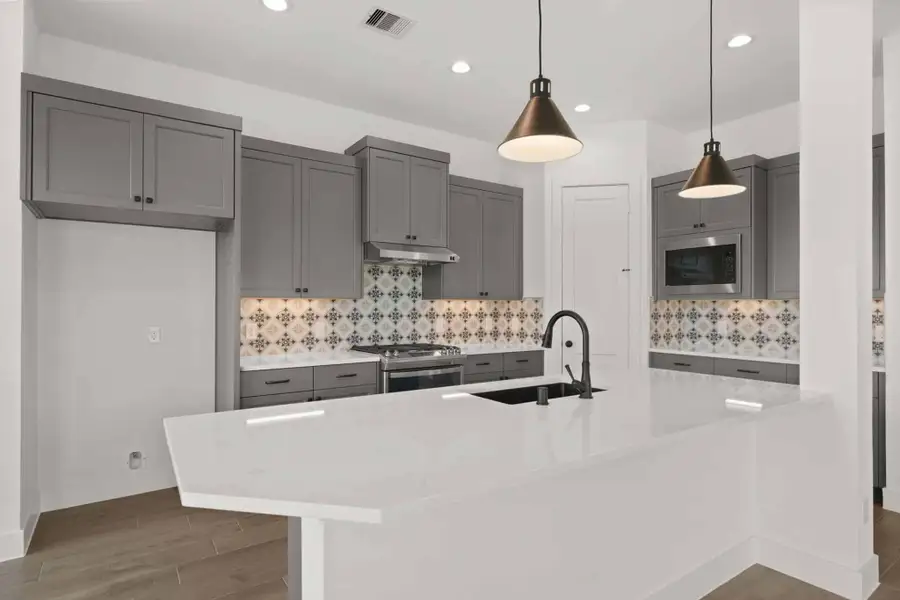 Furnished interior view inside a new home in The Trails, New Caney (Image 5).