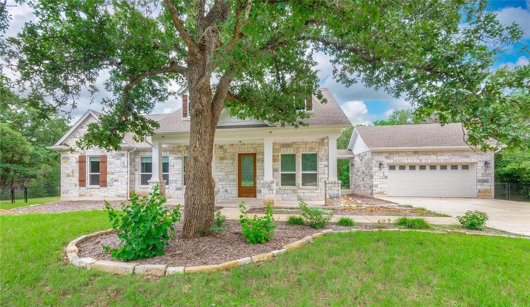 Front exterior of a new home in , Manchaca, TX, highlighting curb appeal (Image 1). Front exterior of a new home in , Manchaca, TX, highlighting curb appeal (Image 1).