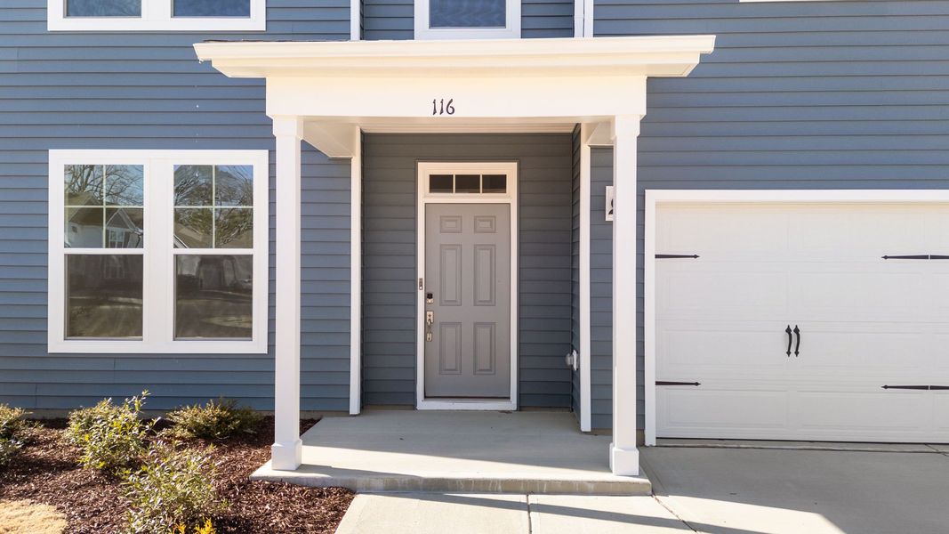Exterior details and patio area of a home in Neill's Pointe, Angier (Image 3).