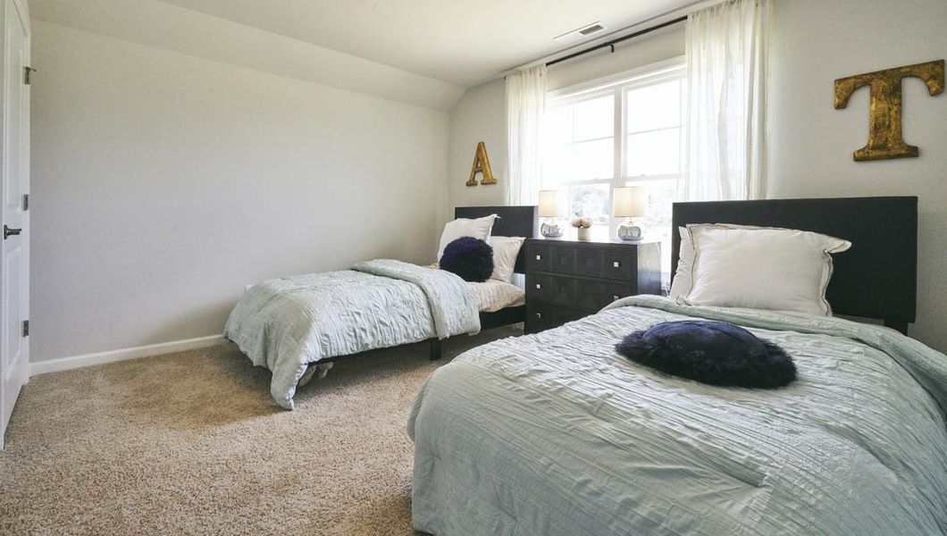Representative furnished interior of a home built from the Dover by D.R. Horton in Quarry Hills - Freedom, Swepsonville (Image 11).