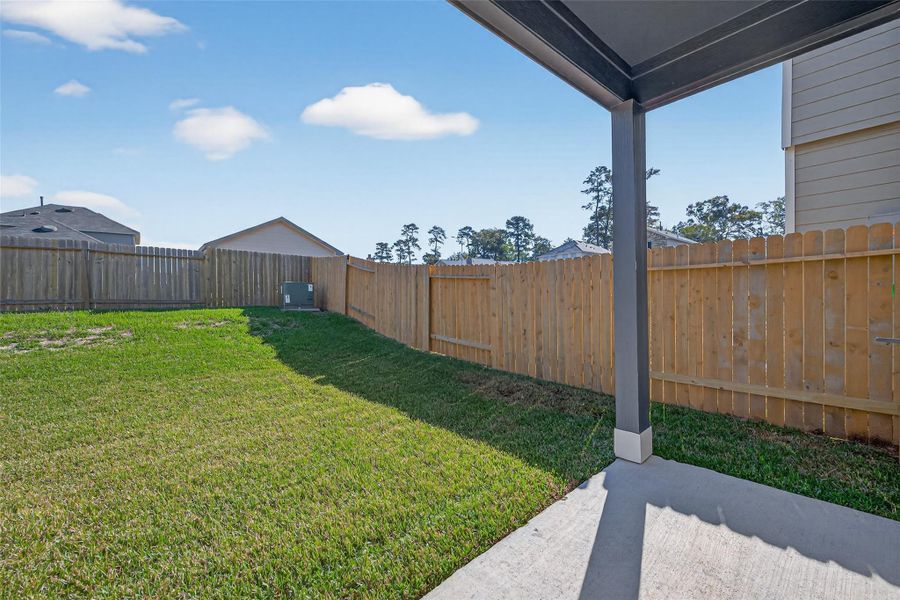 Exterior details and patio area of a home in Woodland Lakes, Houston (Image 2). Exterior details and patio area of a home in Woodland Lakes, Houston (Image 2).