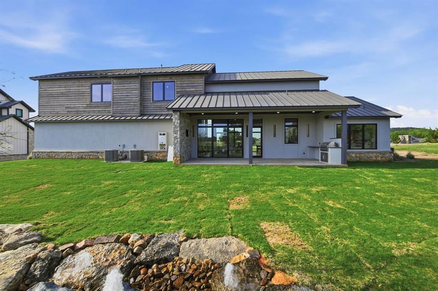 Exterior details and patio area of a home in , Graford (Image 19).