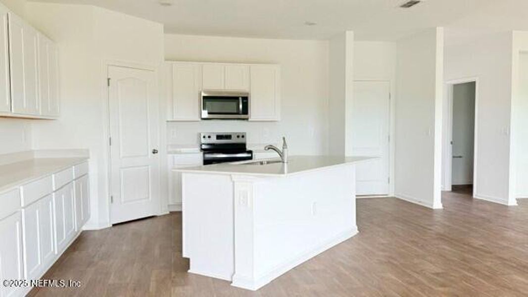 Furnished interior view inside a new home in Rookery, Green Cove Springs (Image 18).