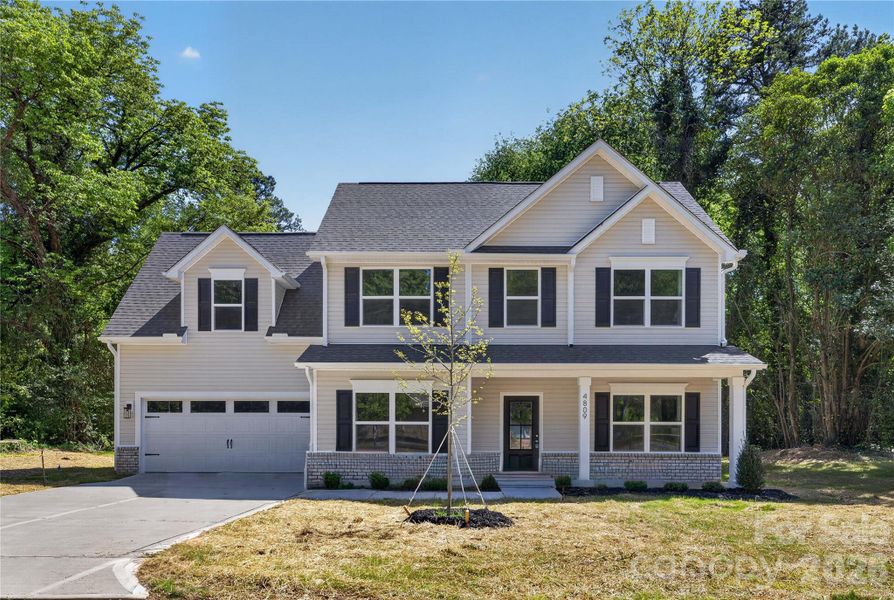 Front exterior of a new home in , Charlotte, NC, highlighting curb appeal (Image 25). Front exterior of a new home in , Charlotte, NC, highlighting curb appeal (Image 25).
