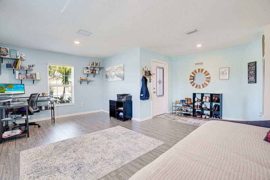 Furnished interior view inside a new home in Celebration Pointe, Fort Pierce (Image 17).
