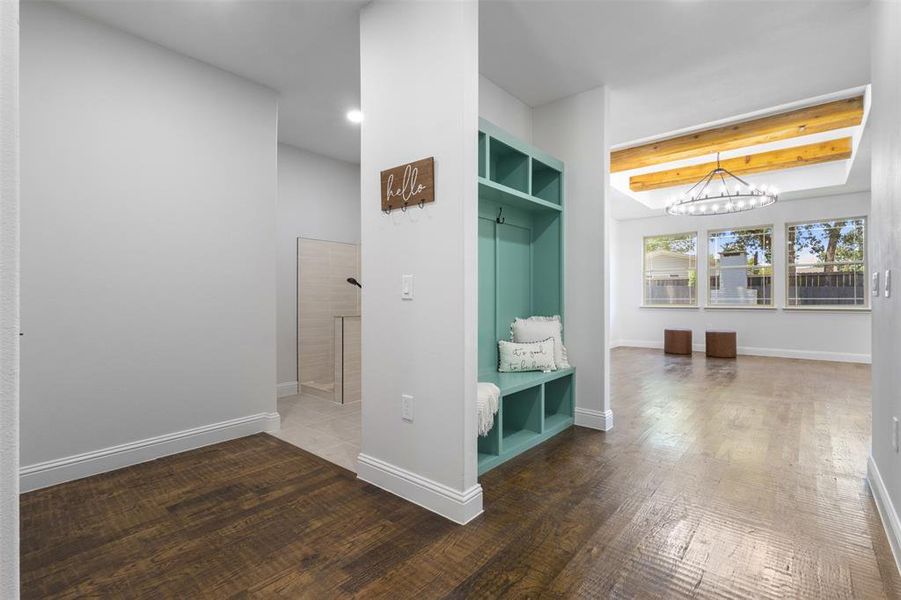 Mudroom with a chandelier, wood finished floors, and recessed lighting Mudroom with a chandelier, wood finished floors, and recessed lighting