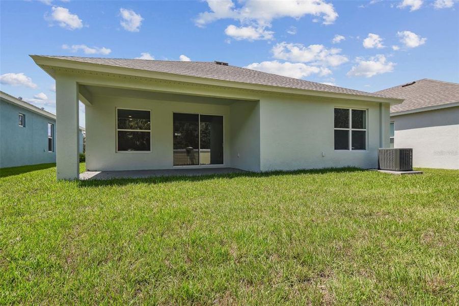 Front exterior of a new home in Cascades at Southern Hills, Brooksville, FL, highlighting curb appeal (Image 31).