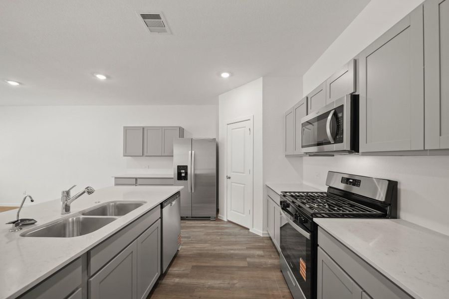 Furnished interior view inside a new home in Grand Pines, Magnolia (Image 4). Furnished interior view inside a new home in Grand Pines, Magnolia (Image 4).