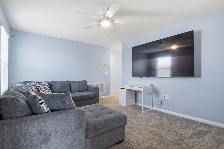 Furnished interior view inside a new home in Wellness Ridge, Clermont (Image 20).