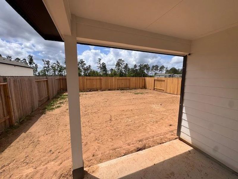 Exterior details and patio area of a home in Townsend Reserve, Splendora (Image 3). Exterior details and patio area of a home in Townsend Reserve, Splendora (Image 3).
