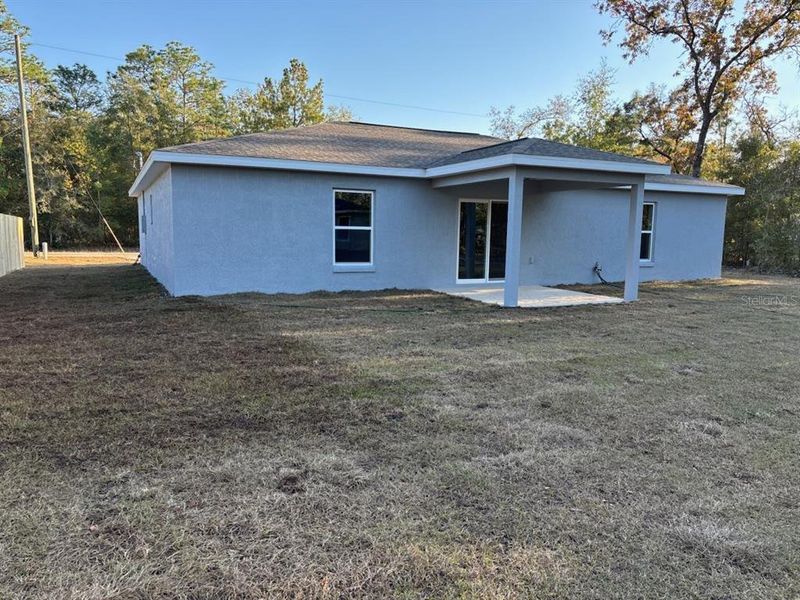 Exterior details and patio area of a home in , Citrus Springs (Image 18).