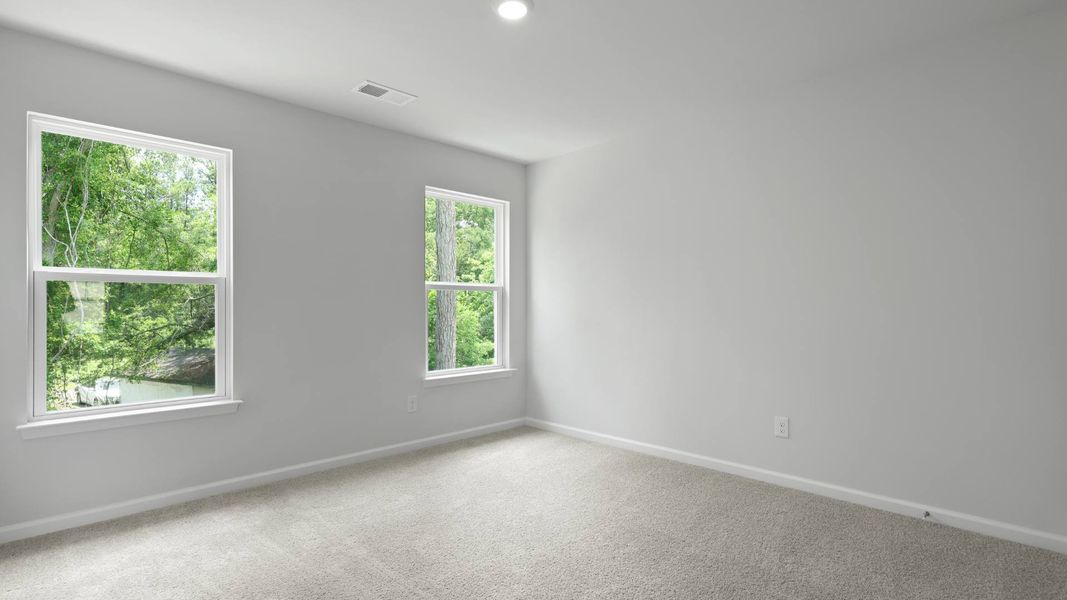 Representative unfurnished interior of a home built from the FORRESTER by D.R. Horton in Founders Corner, Summerville (Image 25).