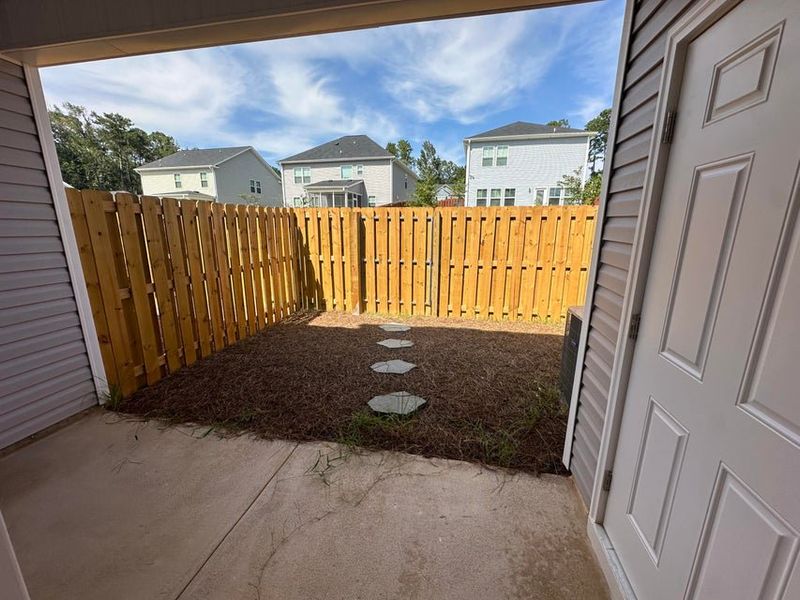 Exterior details and patio area of a home in Forrest Bluff Townhomes, North Augusta (Image 3).