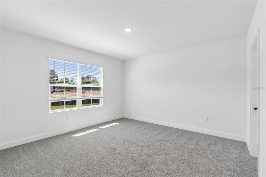 Spacious, unfurnished interior of a new home in Aspire at The Pines, Dunnellon (Image 27).