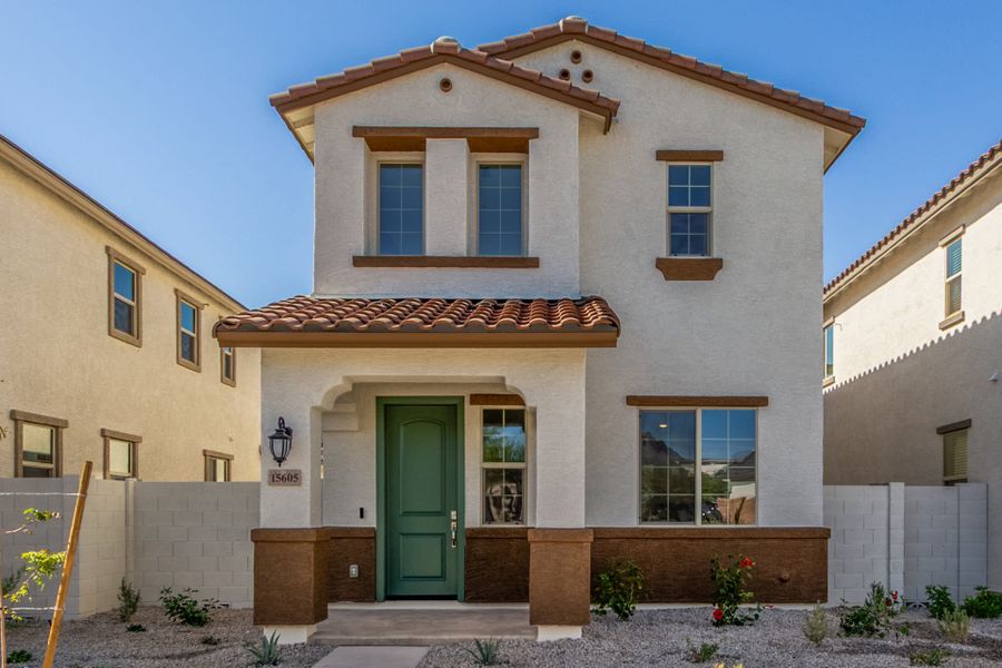 Front exterior of a new home in Solvida at Estrella, Goodyear, AZ, highlighting curb appeal (Image 2).