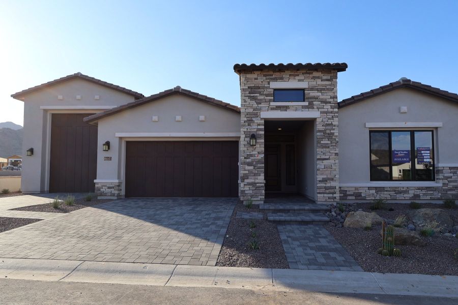 Front exterior of a new home in Alta at Verrado Regent Hills, Buckeye, AZ, highlighting curb appeal (Image 1). Front exterior of a new home in Alta at Verrado Regent Hills, Buckeye, AZ, highlighting curb appeal (Image 1).
