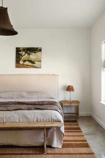 Bedroom featuring baseboards and light wood finished floors