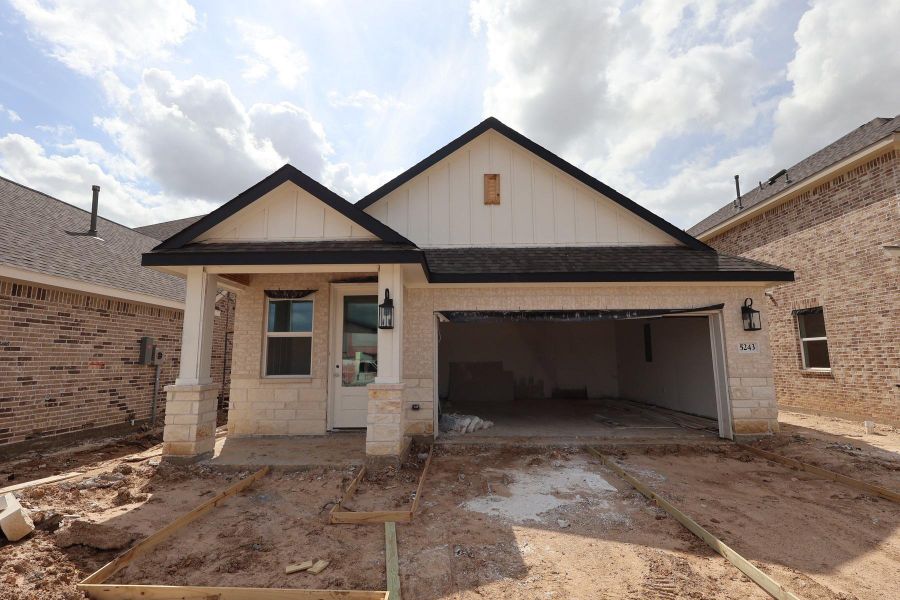 Two story home with 4 beds, 2.5 baths, and 2 car garage.