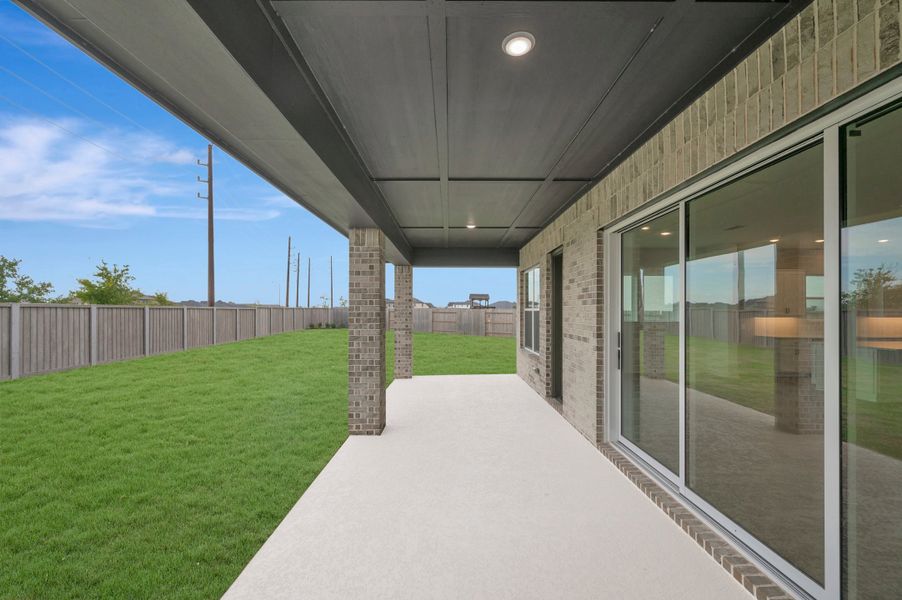 Exterior details and patio area of a home in The Grand Prairie - Retreat Collection, Hockley (Image 3).