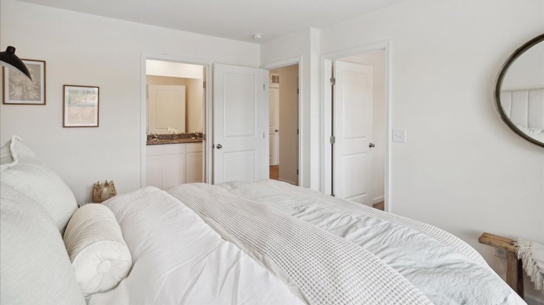 Representative furnished interior of a home built from the Altamont Townhome by D.R. Horton in Saint Marc's, Powell (Image 15).