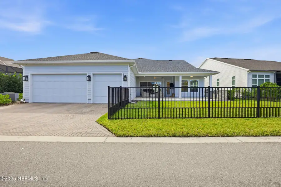 Front exterior of a new home in , Jacksonville, FL, highlighting curb appeal (Image 1).