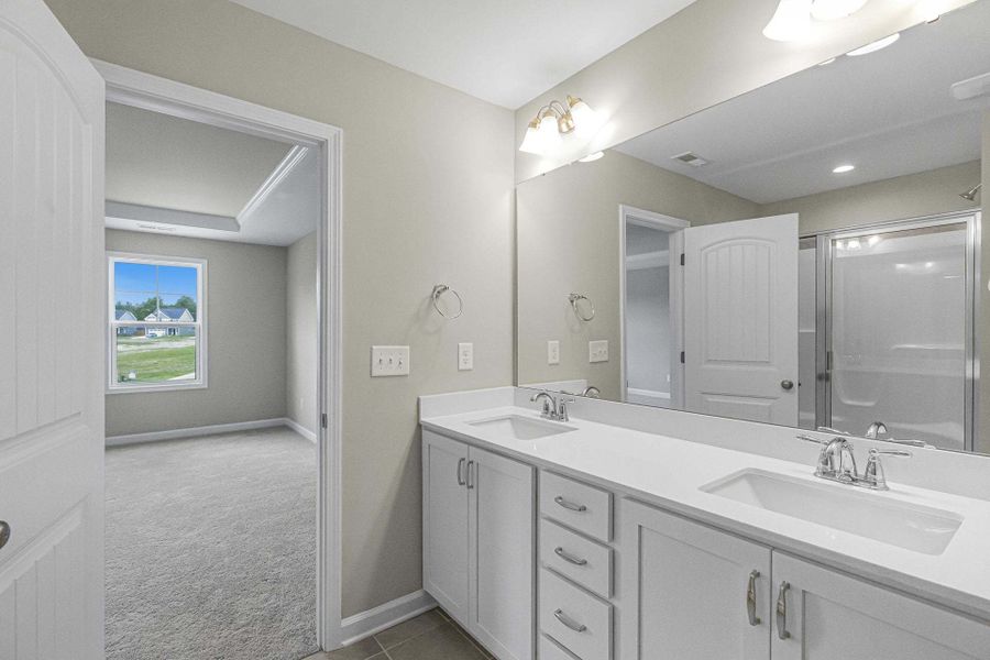 Representative furnished interior of a home built from the Magnolia by Caviness & Cates Communities in Bartlett Manor, Youngsville (Image 219).
