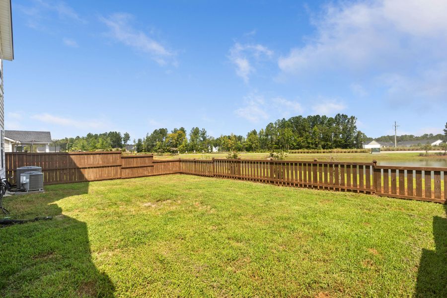 Exterior details and patio area of a home in Sweetgrass at Summers Corner, Summerville (Image 21).