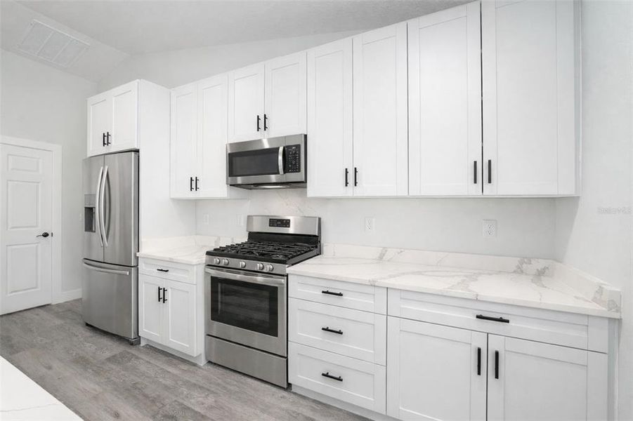 Furnished interior view inside a new home in , Summerfield (Image 8).
