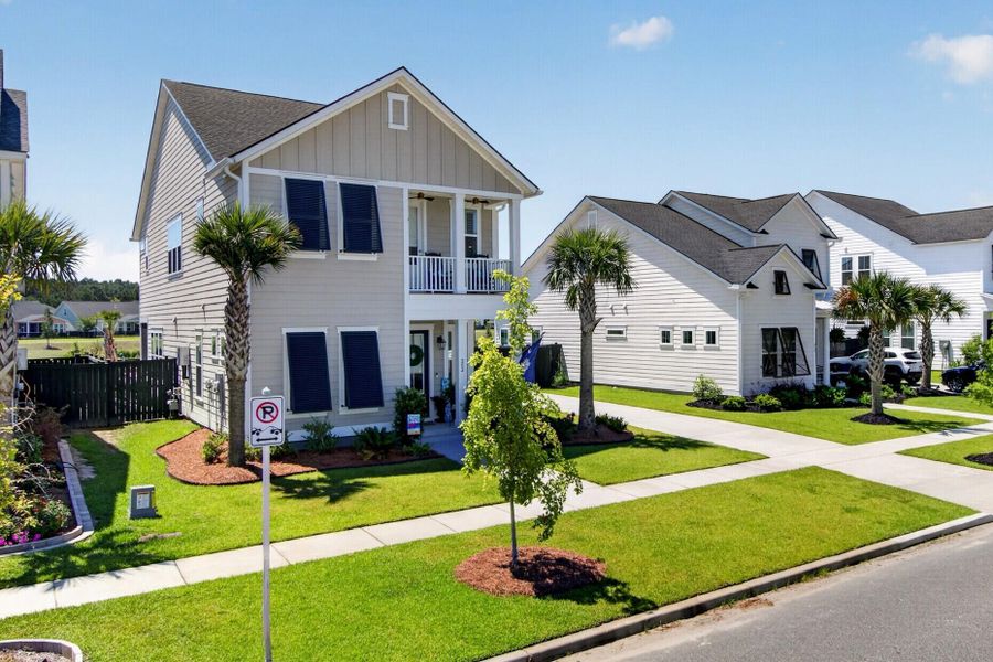 Front exterior of a new home in Carnes Crossroads, Summerville, SC, highlighting curb appeal (Image 26).
