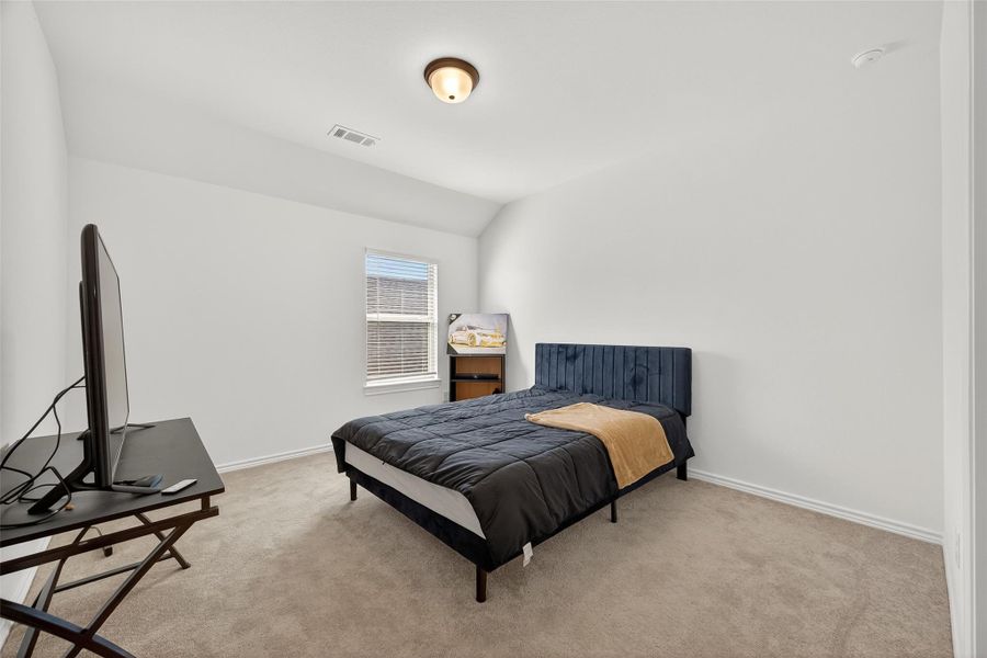 Furnished interior view inside a new home in Sunterra, Katy (Image 36).