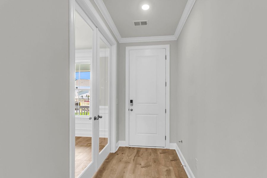 Spacious, unfurnished interior of a new home in Tidewater at Lakes of Cane Bay, Summerville (Image 19). Spacious, unfurnished interior of a new home in Tidewater at Lakes of Cane Bay, Summerville (Image 19).