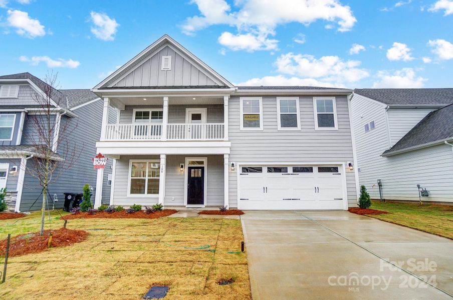 Homesite 68 features a Wilmington E floorplan with double front porch and front-load garage.