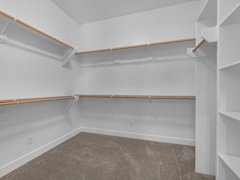 Large walk-in closet Large walk-in closet
