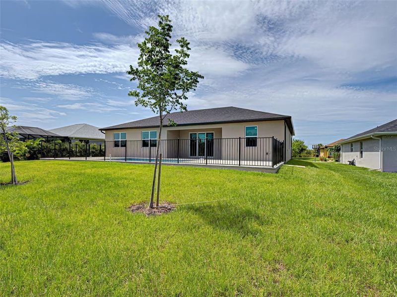 Exterior details and patio area of a home in , Port Charlotte (Image 22).