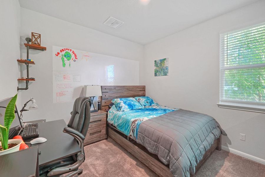 Furnished interior view inside a new home in Stallion Run, Buda (Image 14).