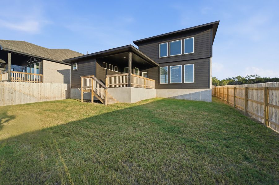 Exterior details and patio area of a home in The Woodlands at Medina Hills, Mico (Image 4).