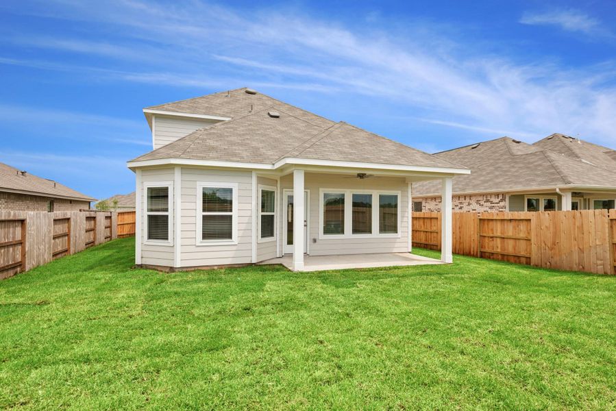 Front exterior of a new home in Miller's Pond, Rosenberg, TX, highlighting curb appeal (Image 14).