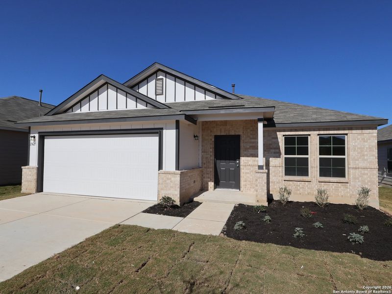 Front exterior of a new home in Winding Brook, San Antonio, TX, highlighting curb appeal (Image 19).