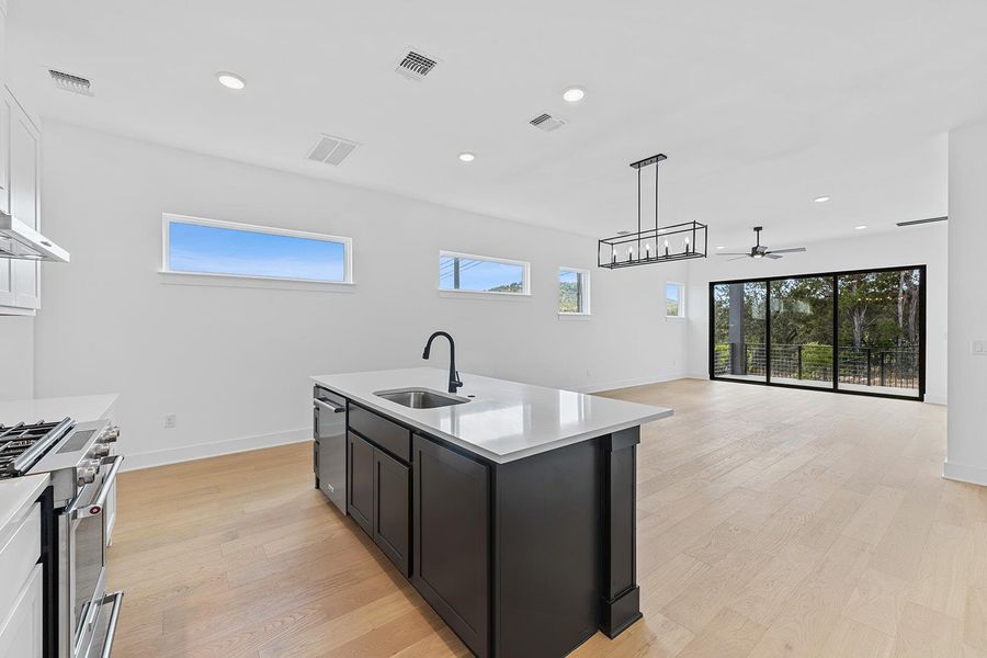 Furnished interior view inside a new home in Rough Hollow The District, Lakeway (Image 2). Furnished interior view inside a new home in Rough Hollow The District, Lakeway (Image 2).