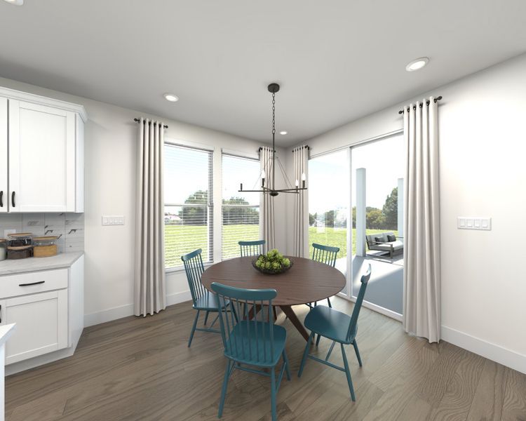 The open-concept floorplan allows for an easy flow between the kitchen and dining areas.