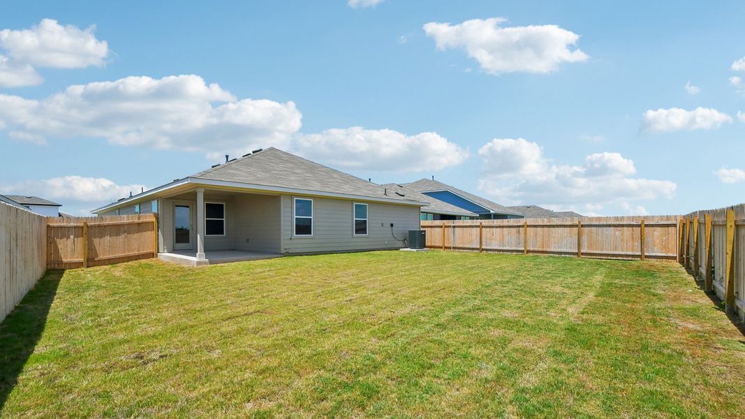 Exterior details and patio area of a home in Carillon, Manor (Image 20).