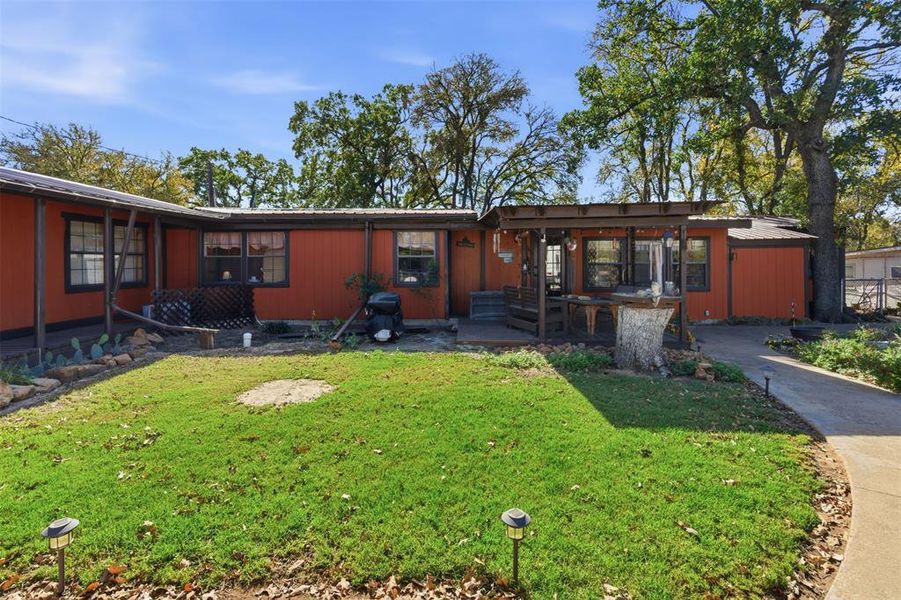 Front of home and front yard- front deck Front of home and front yard- front deck
