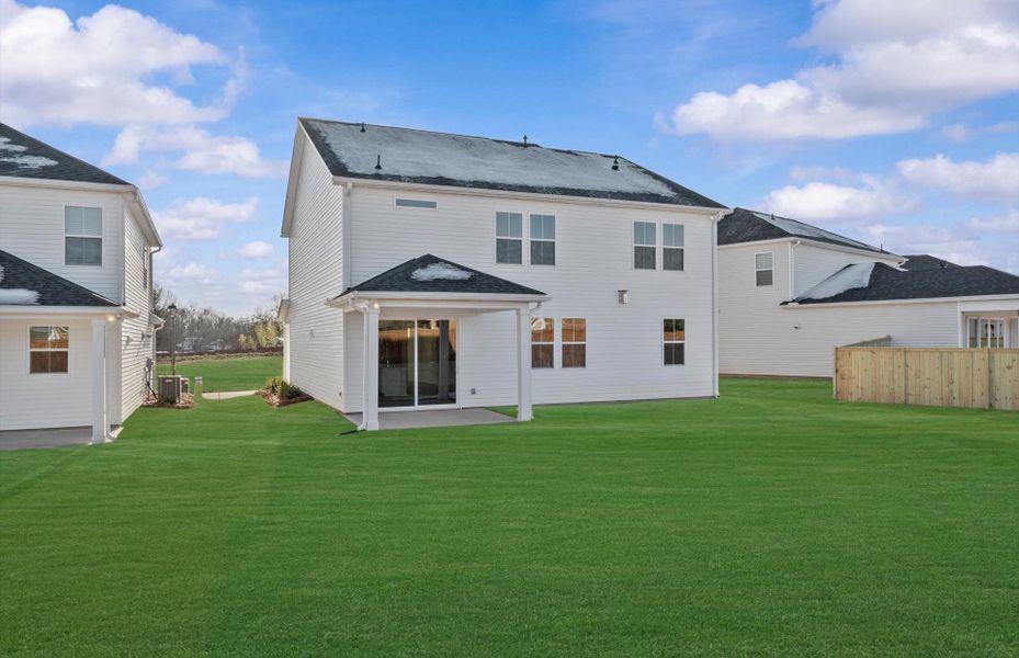 Exterior details and patio area of a home in Fox Hollow, Spartanburg (Image 4).